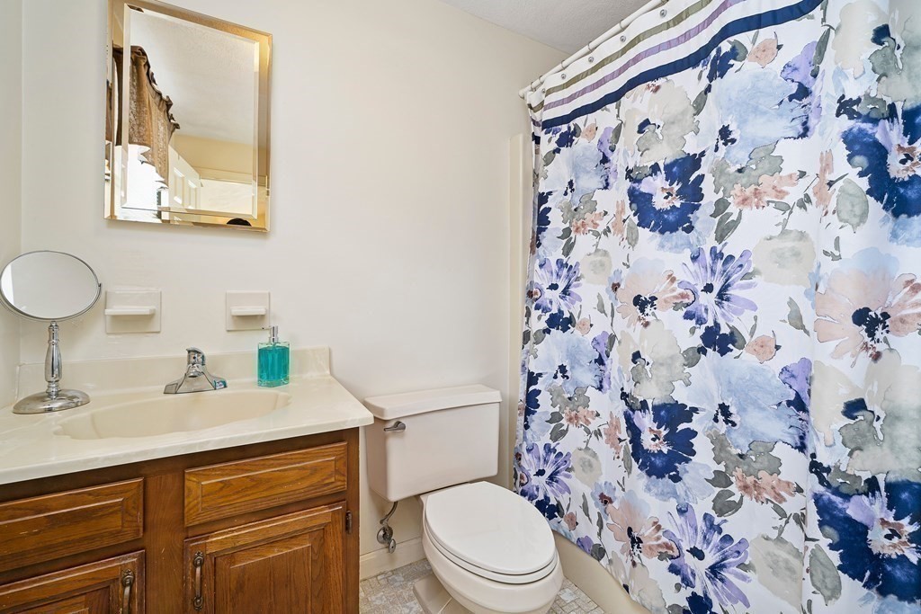 160 Winchester Road Arlington, MA 02474 - Photo 23 of 33 a bathroom with a sink toilet and shower