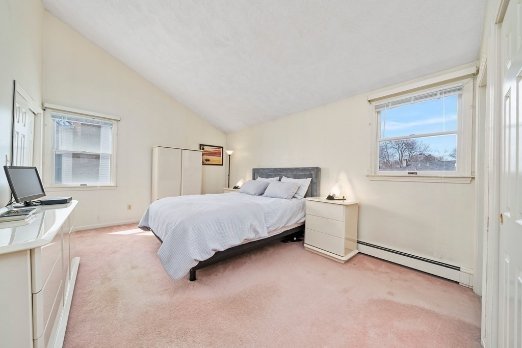 160 Winchester Road Arlington, MA 02474 - Photo 24 of 33 a bedroom with a bed and a flat screen tv