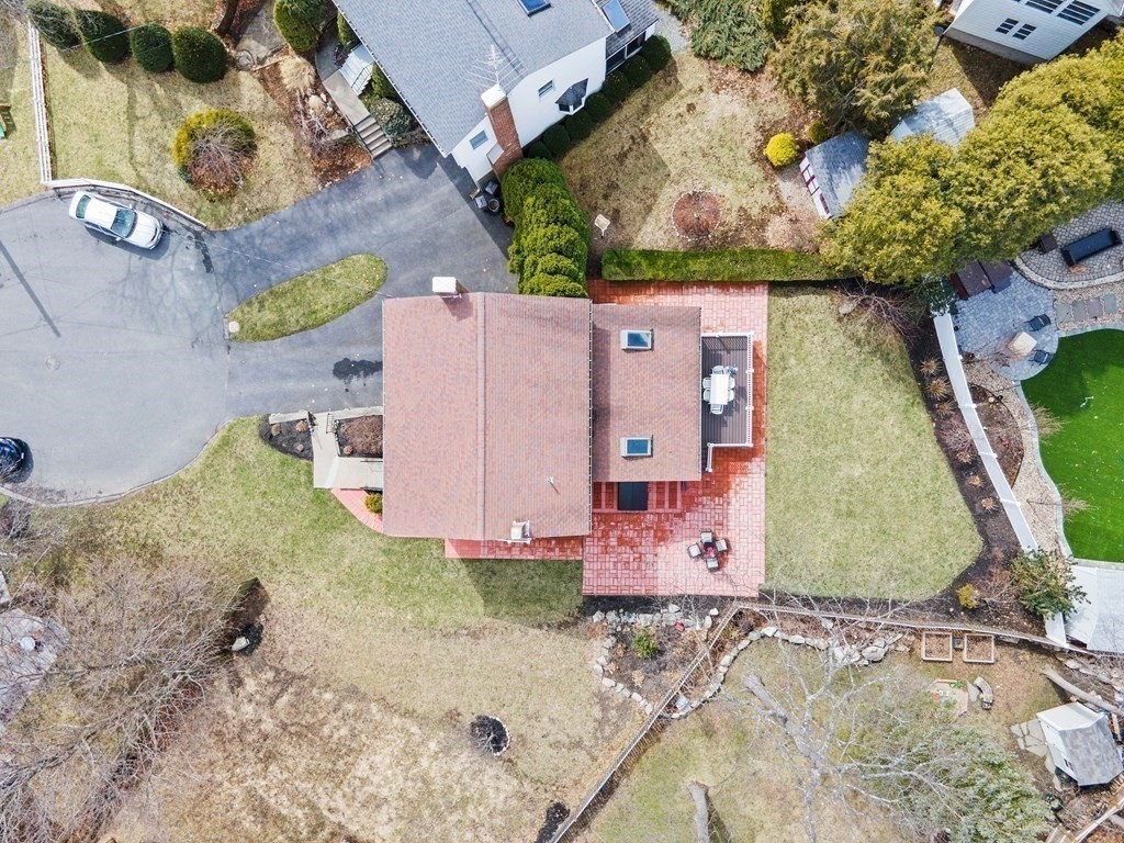 160 Winchester Road Arlington, MA 02474 - Photo 31 of 33 an aerial view of a house with a yard and large tree