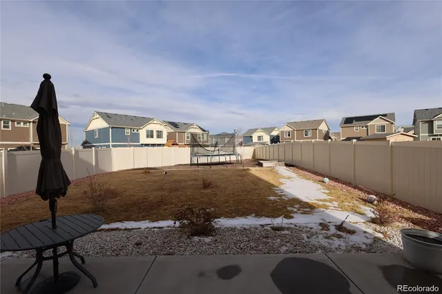 a view of a livingroom with furniture and window