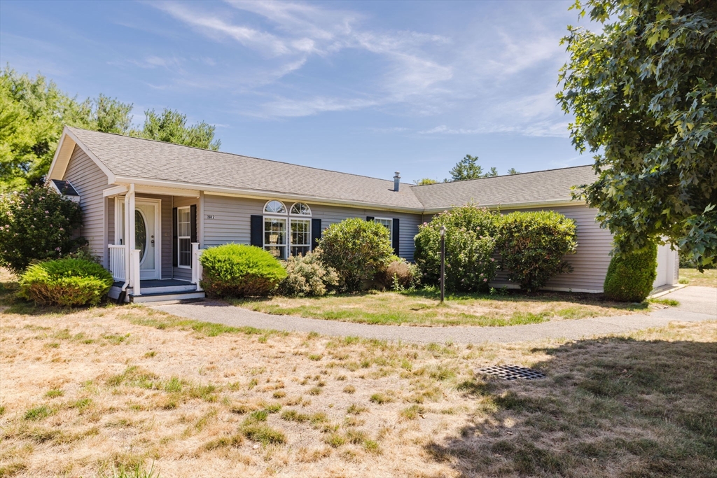2602 Green Street Middleboro, MA 02346 - Photo 1 of 26 a view of a house with a yard and plant in front of it