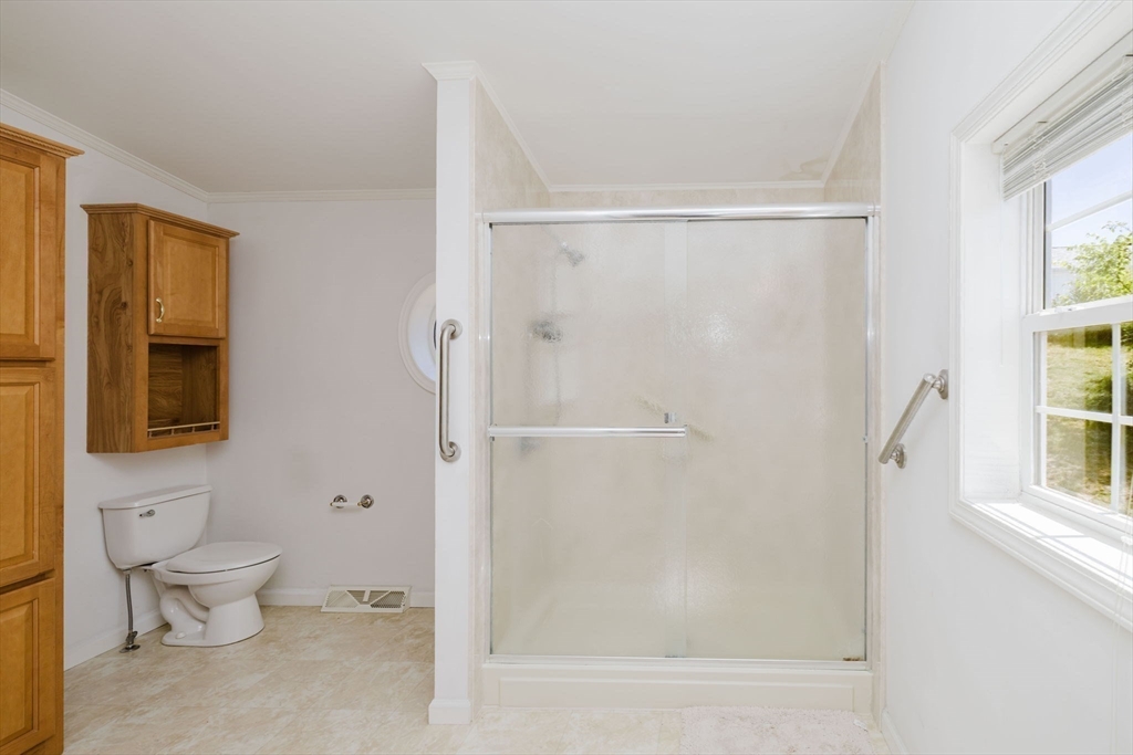 2602 Green Street Middleboro, MA 02346 - Photo 14 of 26 a bathroom with a toilet and a shower