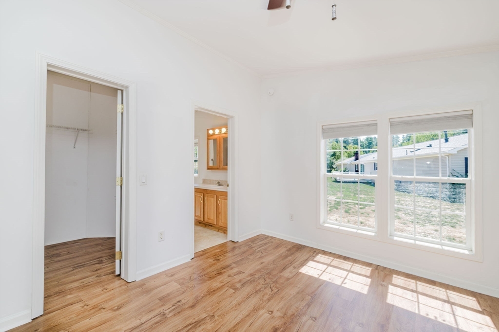 2602 Green Street Middleboro, MA 02346 - Photo 15 of 26 a view of empty room with wooden floor and fan