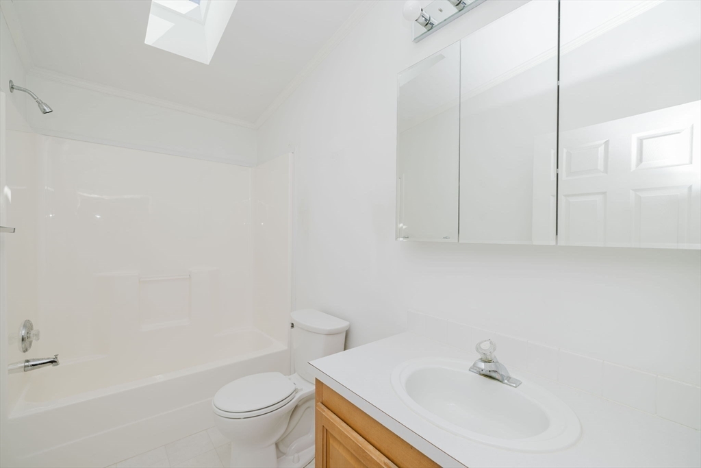 2602 Green Street Middleboro, MA 02346 - Photo 16 of 26 a bathroom with a sink a toilet and bathtub