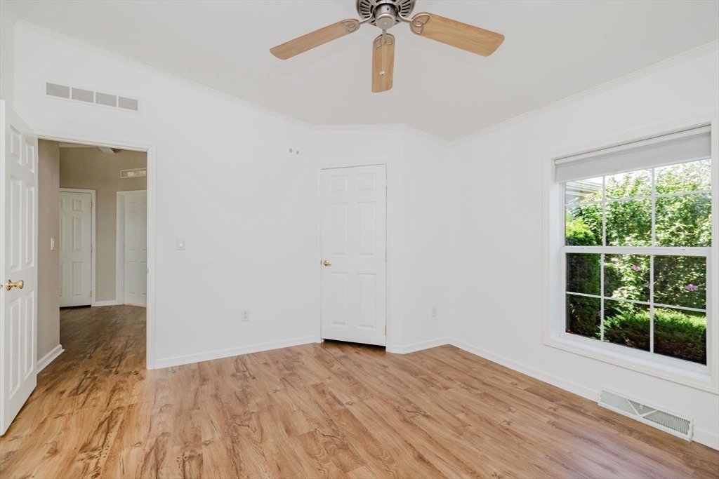 2602 Green Street Middleboro, MA 02346 - Photo 17 of 26 a view of empty room with wooden floor and fan