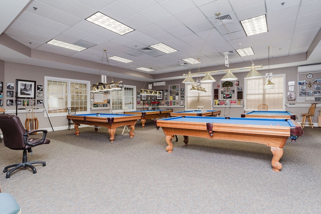 2602 Green Street Middleboro, MA 02346 - Photo 21 of 26 a living room with furniture pool table and a projector screen