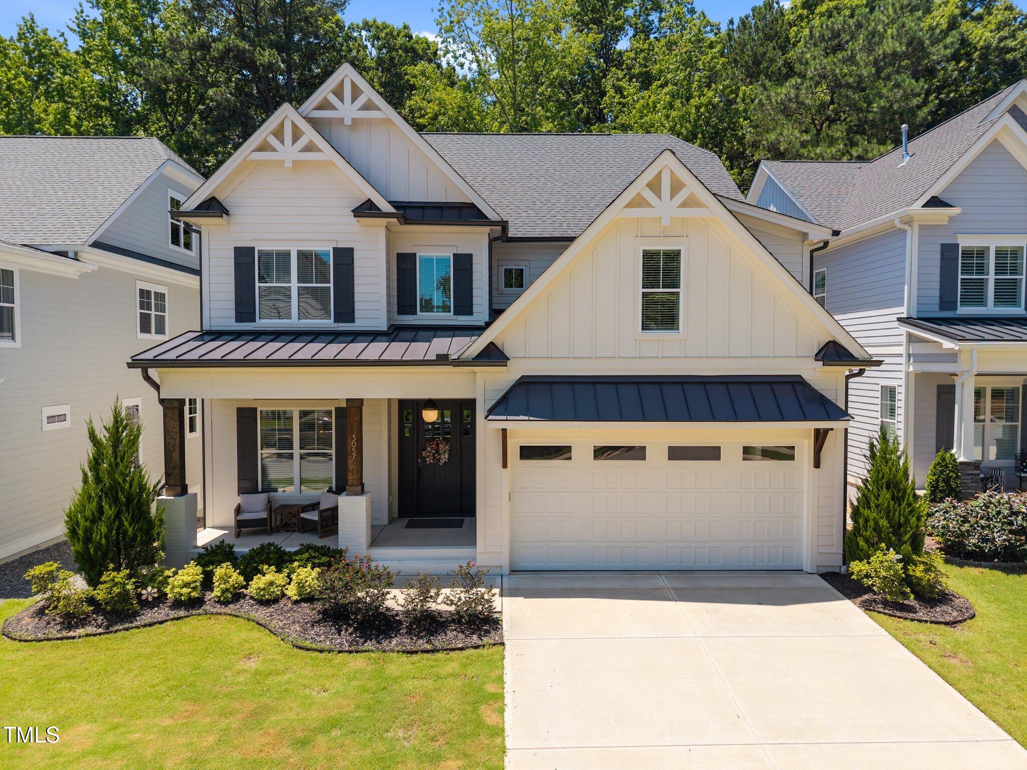 3057 Eden Harbor Court Raleigh, NC 27613 - Photo 1 of 46 1-web-or-mls-DJI_20250620135006_0165_D