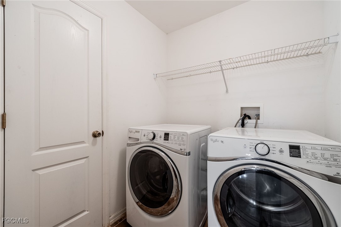 2406 East 23rd Street Alva, FL 33920 - Photo 23 of 33 a utility room with dryer and washer