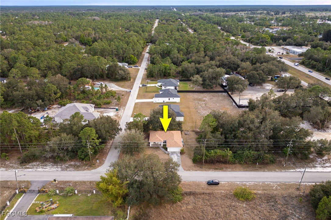 2406 East 23rd Street Alva, FL 33920 - Photo 29 of 33 an aerial view of a houses with a yard