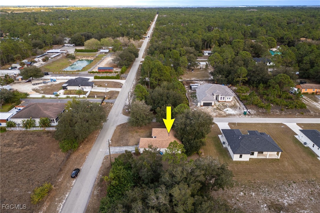 2406 East 23rd Street Alva, FL 33920 - Photo 30 of 33 an aerial view of residential houses with outdoor space