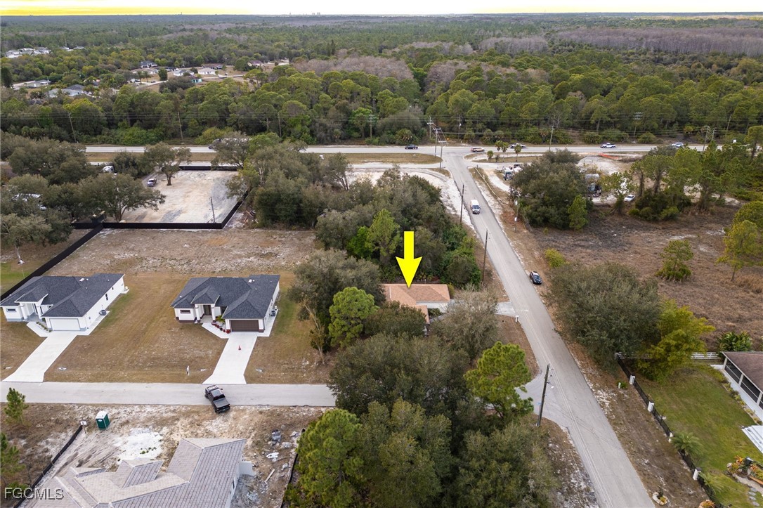 2406 East 23rd Street Alva, FL 33920 - Photo 33 of 33 an aerial view of a house with a swimming pool