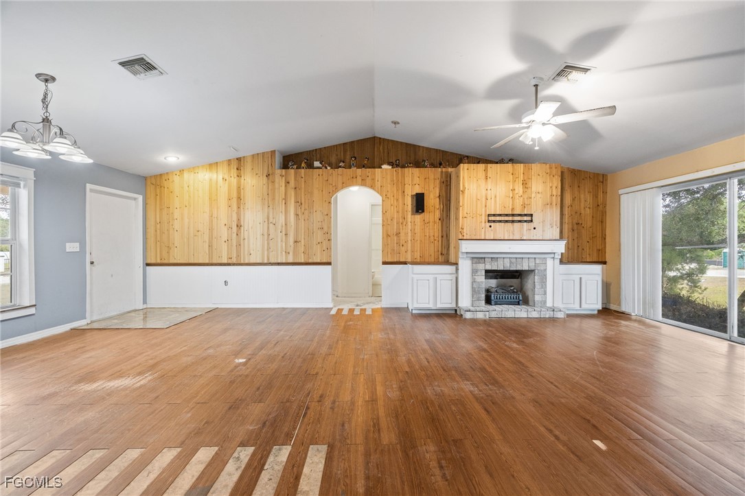 2406 East 23rd Street Alva, FL 33920 - Photo 7 of 33 a view of empty room with wooden floor and fan