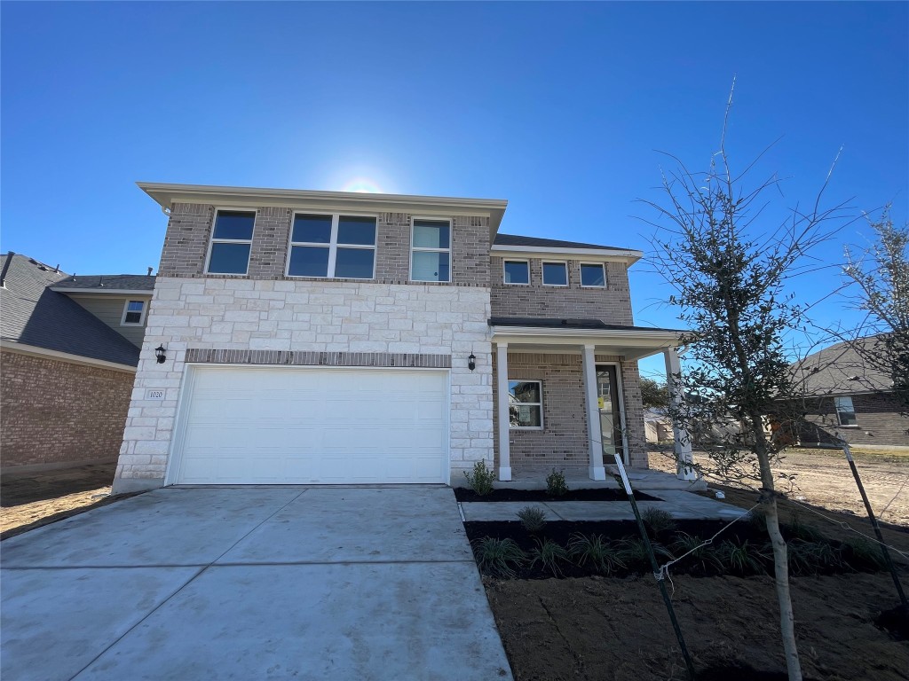 1020 Sienna Bear Road Georgetown, TX 78633 - Photo 1 of 1 a front view of house with yard