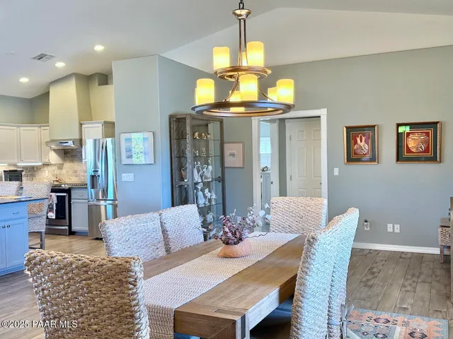 a bathroom with a sink a mirror and a toilet
