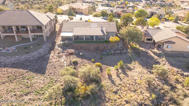 view of a bench in front of building