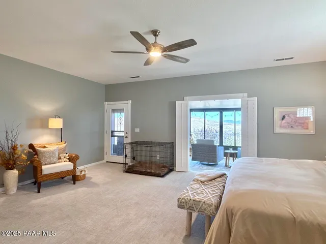 a bathroom with a double vanity sink toilet mirror and shower