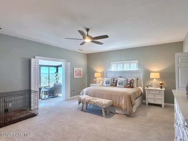 a living room with furniture and garden