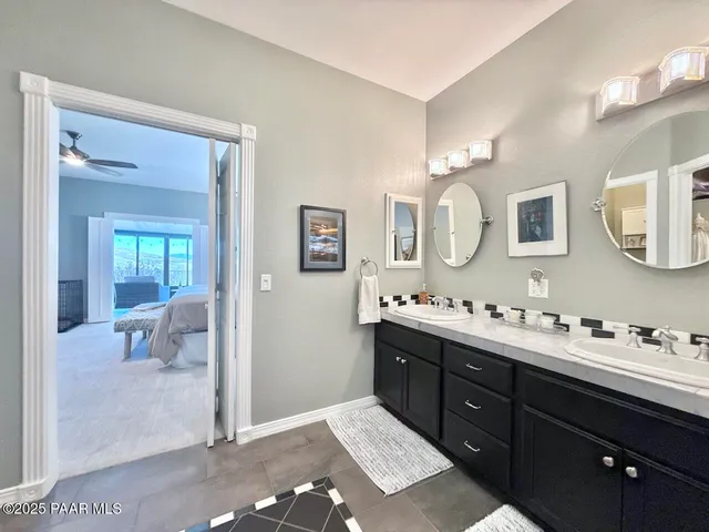 a view of a porch with furniture and a yard