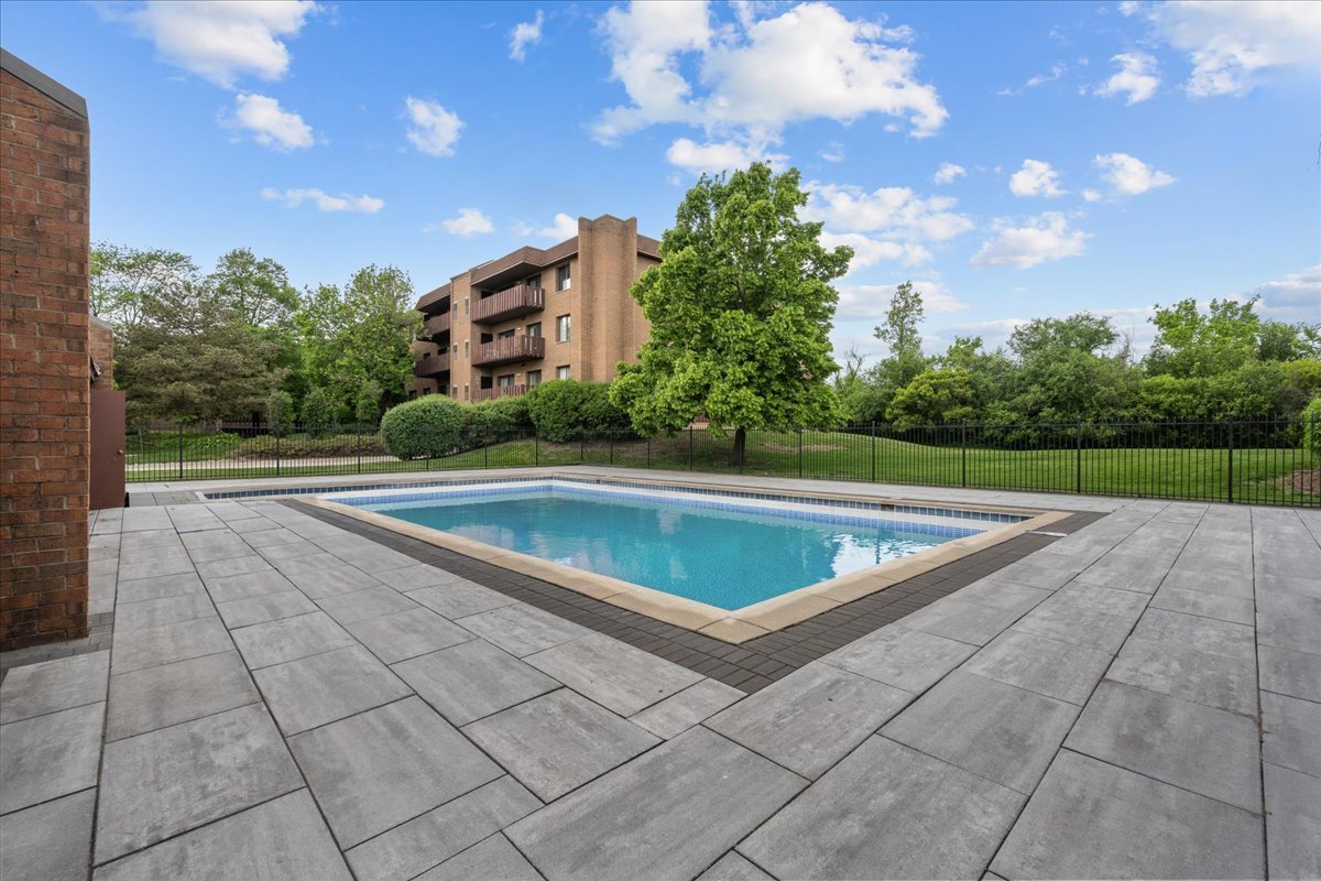 1795 Lake Cook Road, Unit 107 Highland Park, IL 60035 - Photo 23 of 26 a view of outdoor space and tennis court