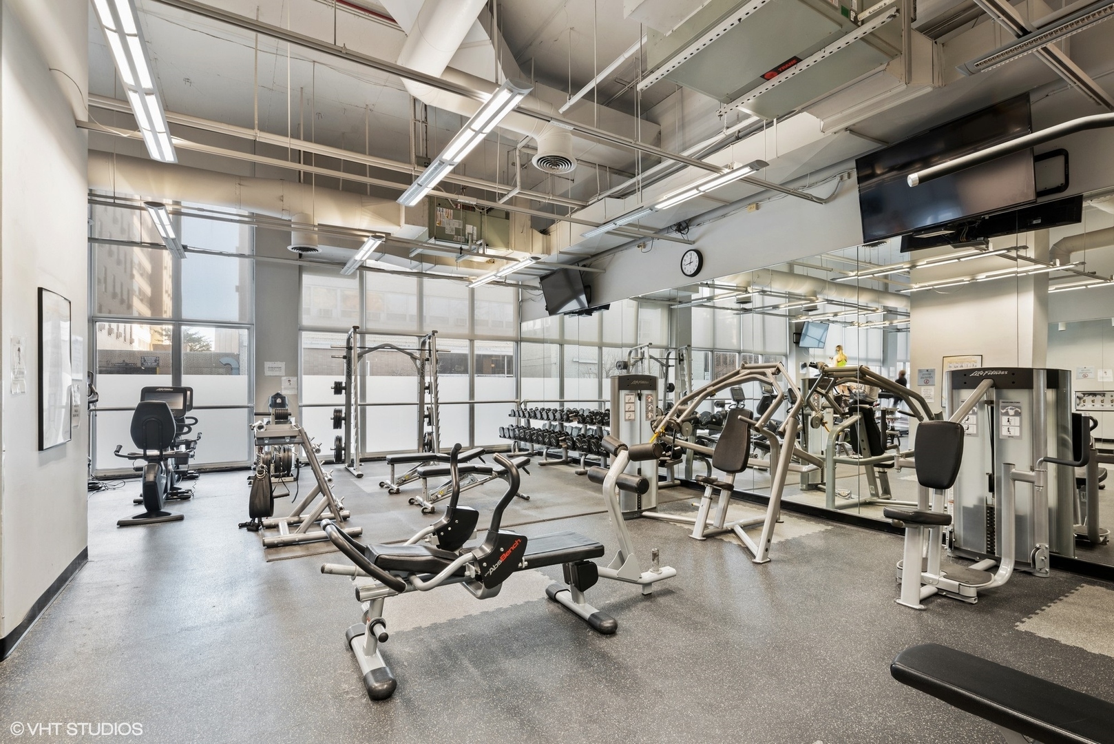 655 West Irving Park Road, Unit 5306 Chicago, IL 60613 - Photo 26 of 28 a view of a room with gym equipment