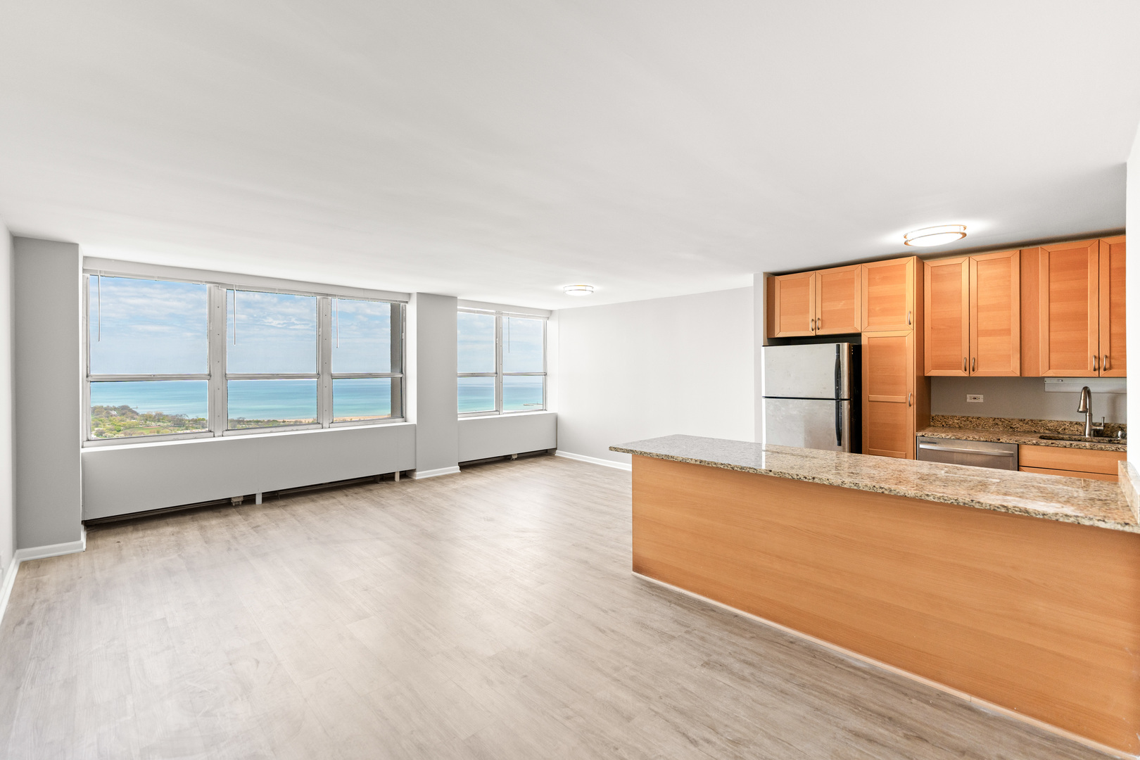 655 West Irving Park Road, Unit 5306 Chicago, IL 60613 - Photo 4 of 28 a view of a large window with wooden floor