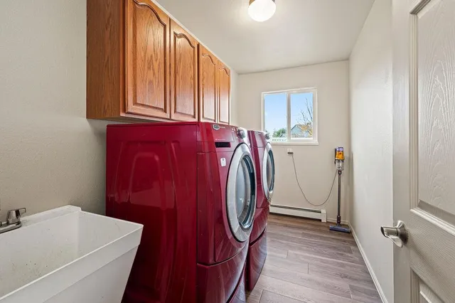 a utility room with dryer and washer