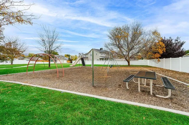 a view of a yard with a slide