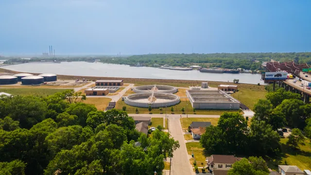 an aerial view of a city with lawn chairs