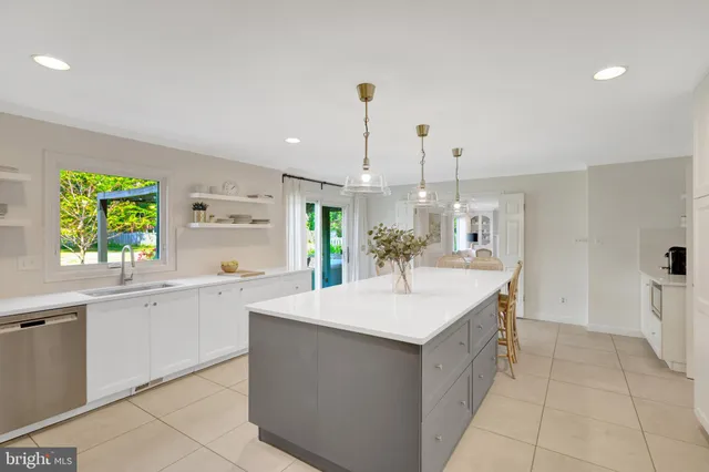 a bathroom with a sink and shower