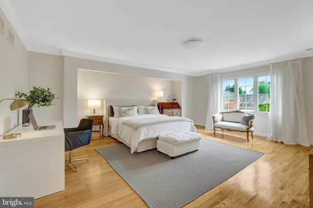 a kitchen with a table and chairs in it