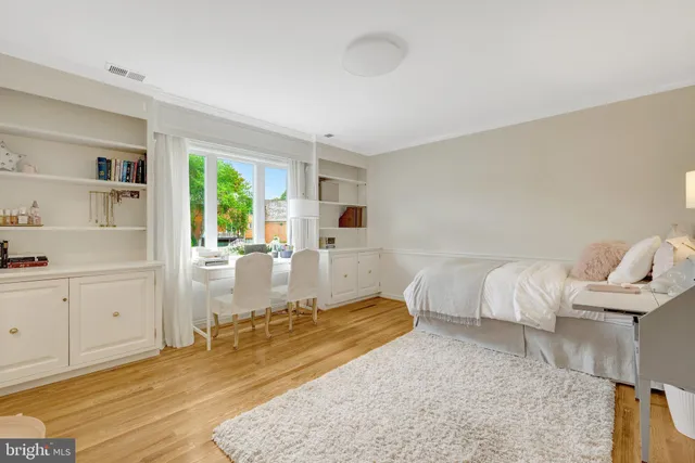 a front view of a house with swimming pool yard and outdoor seating