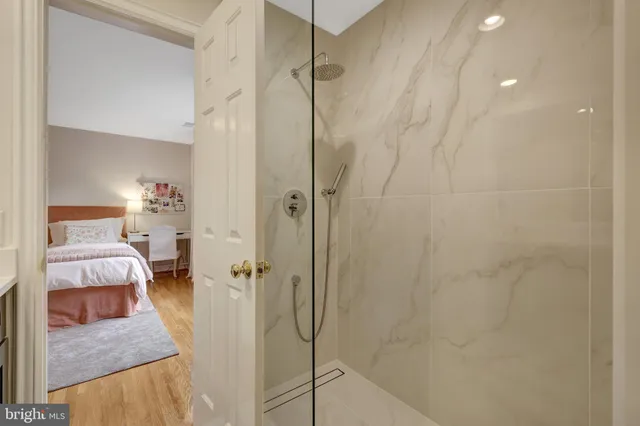 a view of a patio with couches plants and a big yard