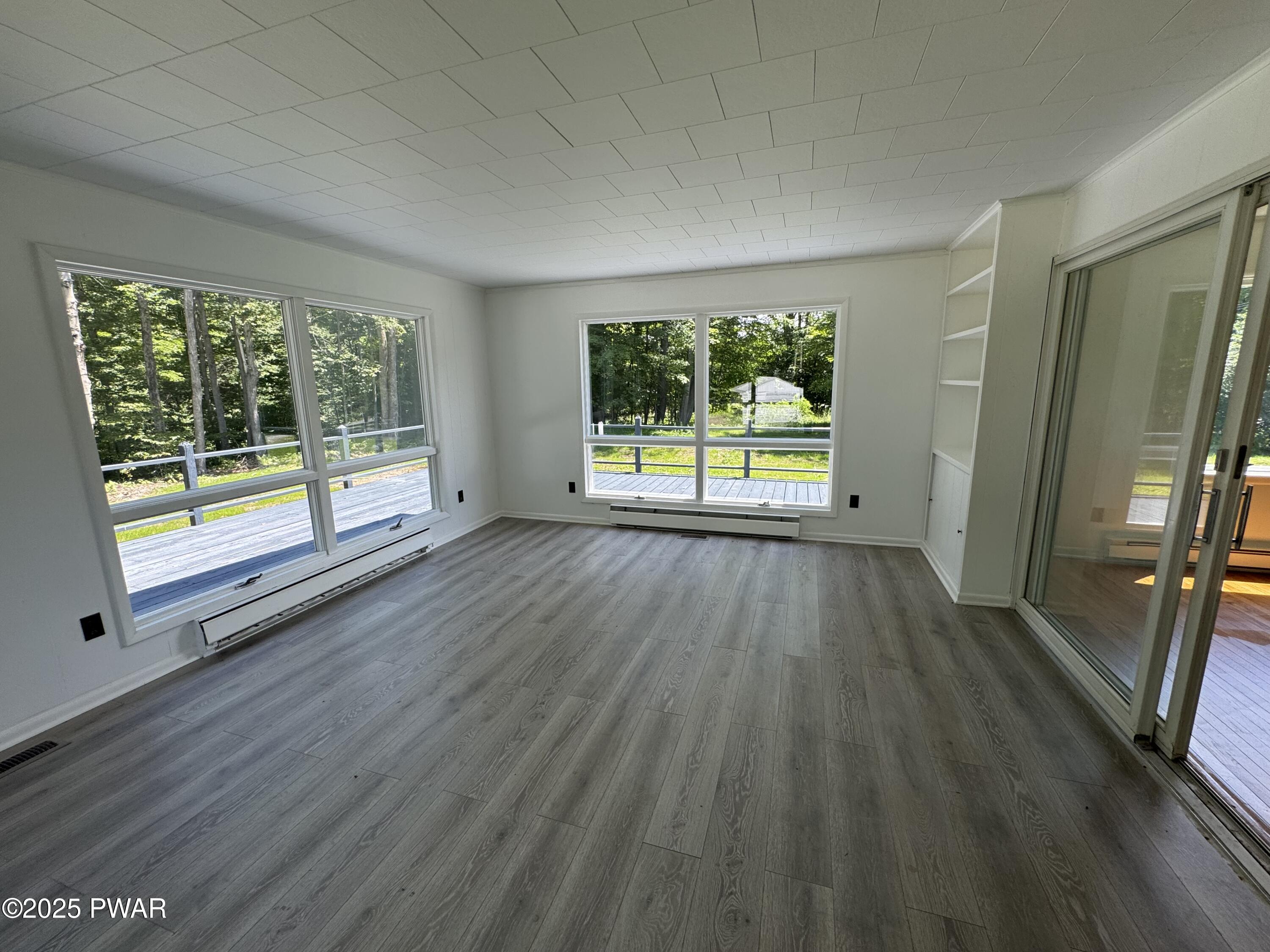 69 Como Road Lakewood, PA 18439 - Photo 11 of 26 Sunroom/Possible 3rd Bedroom