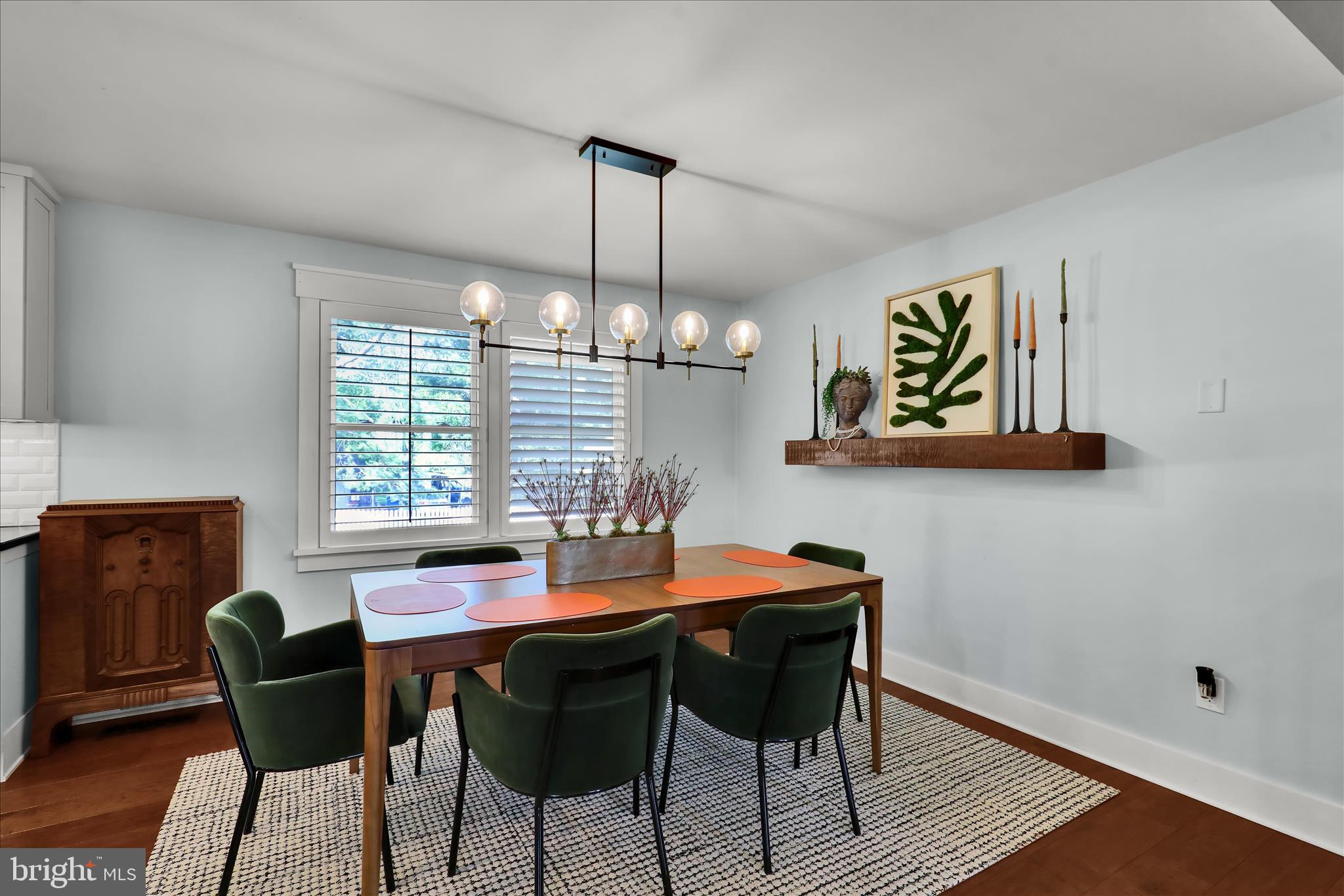 45 Mast Road Oley, PA 19547 - Photo 12 of 39 a view of a dining room with furniture window and wooden floor