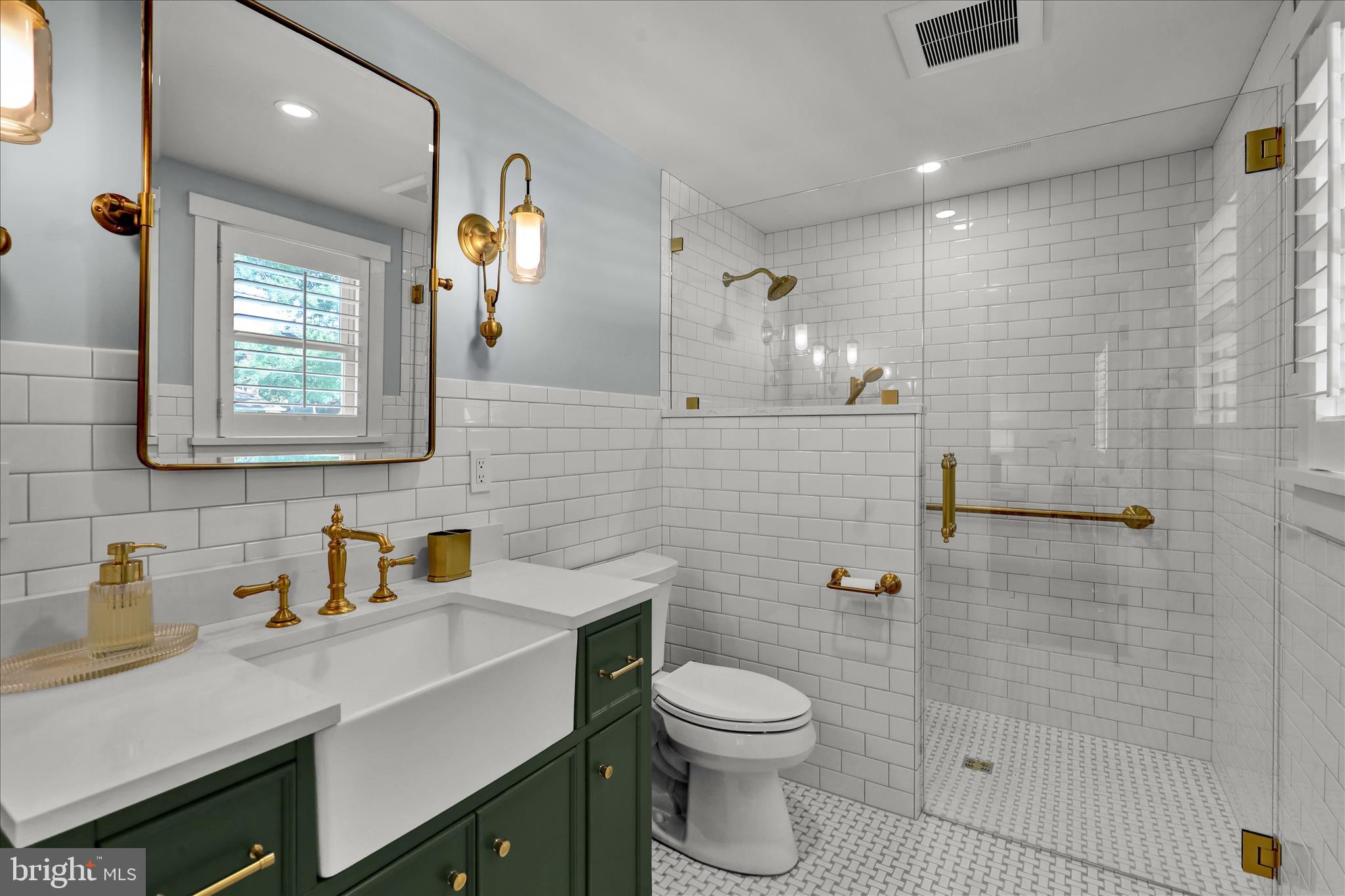 45 Mast Road Oley, PA 19547 - Photo 20 of 39 a bathroom with a sink a toilet and shower