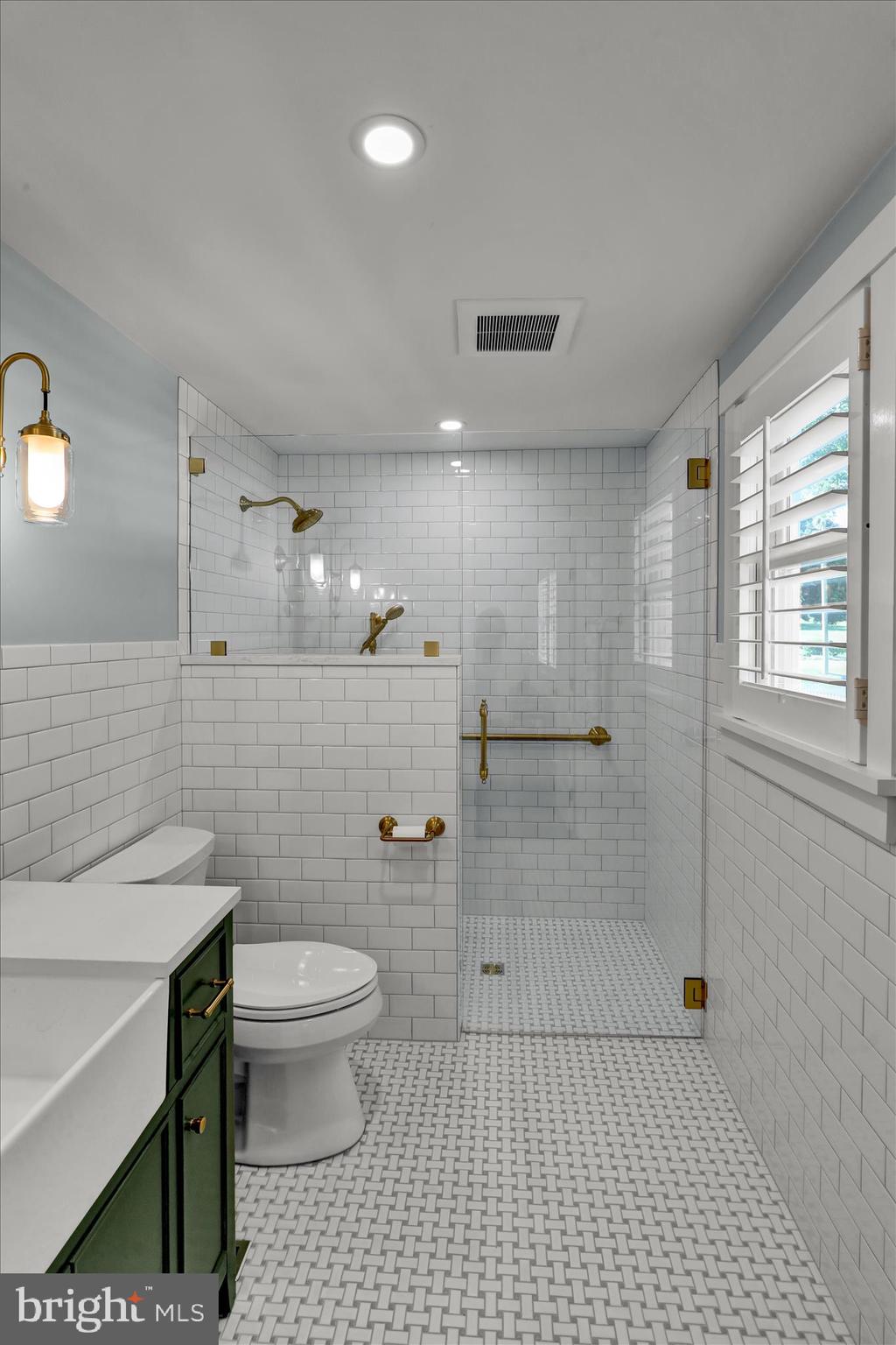45 Mast Road Oley, PA 19547 - Photo 21 of 39 a bathroom with a sink a toilet and shower