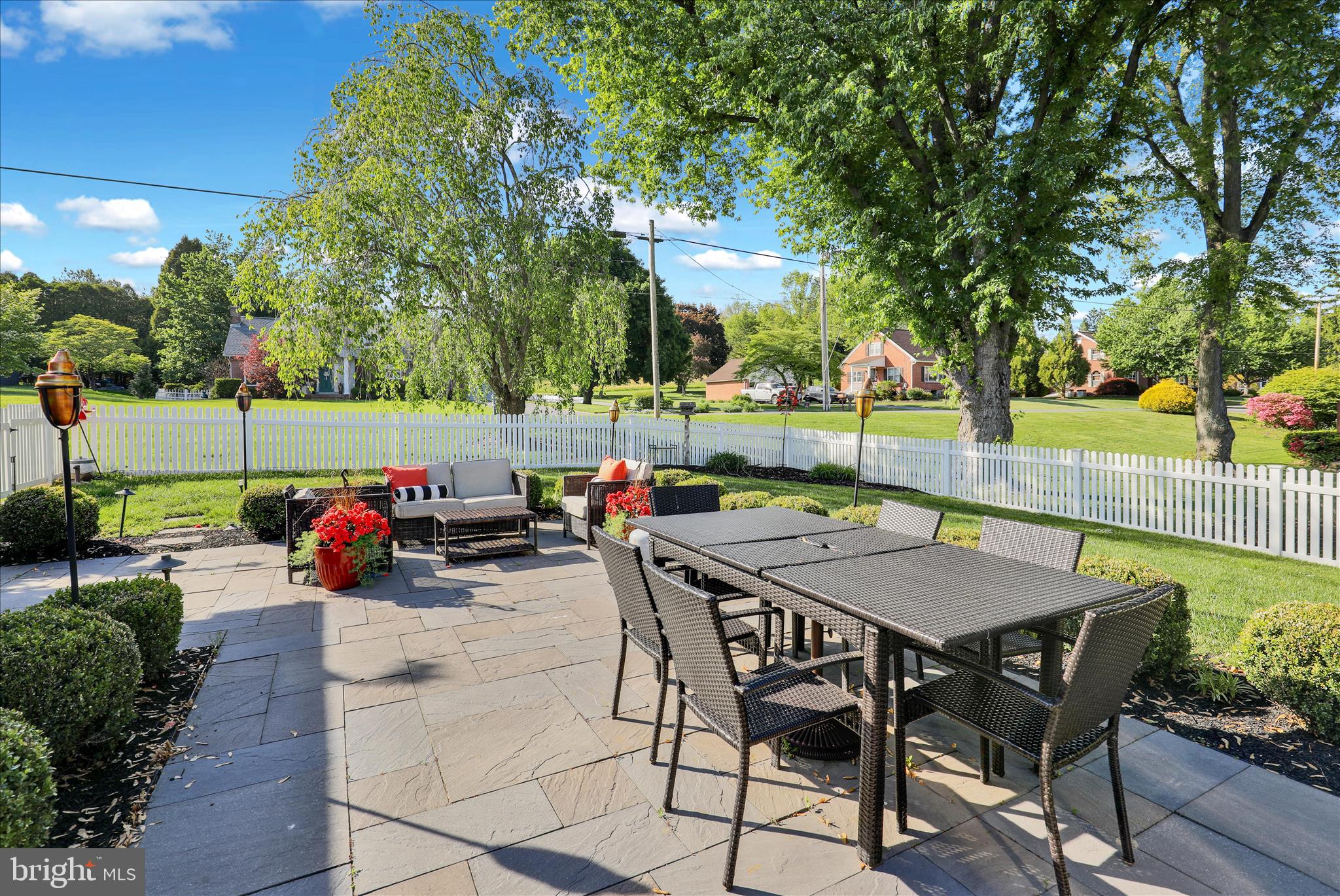 45 Mast Road Oley, PA 19547 - Photo 35 of 39 a view of a patio with table and chairs and potted plants