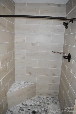 a bathroom with sink and mirror