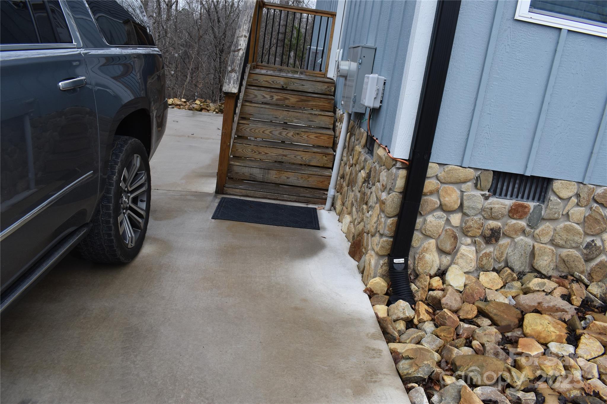 17 Meredith Lane Marion, NC 28752 - Photo 3 of 42 a view of water heater room with stairs