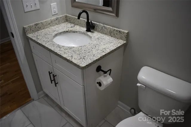 a bathroom with a toilet