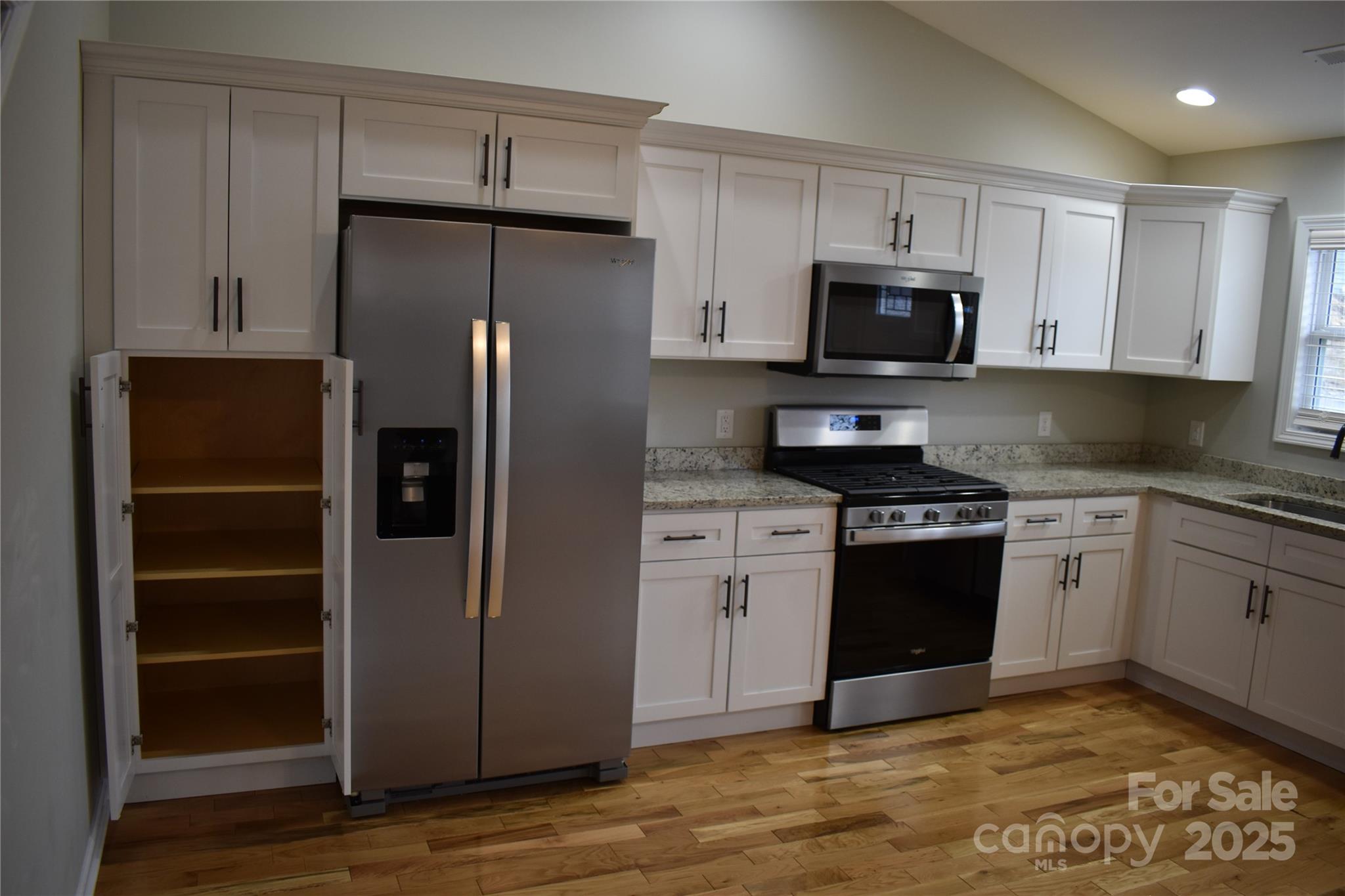17 Meredith Lane Marion, NC 28752 - Photo 9 of 42 a kitchen with stainless steel appliances granite countertop a refrigerator stove and sink