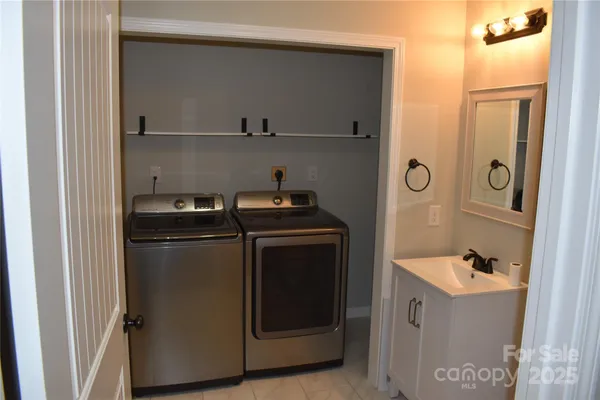 a kitchen with stainless steel appliances a stove and a refrigerator