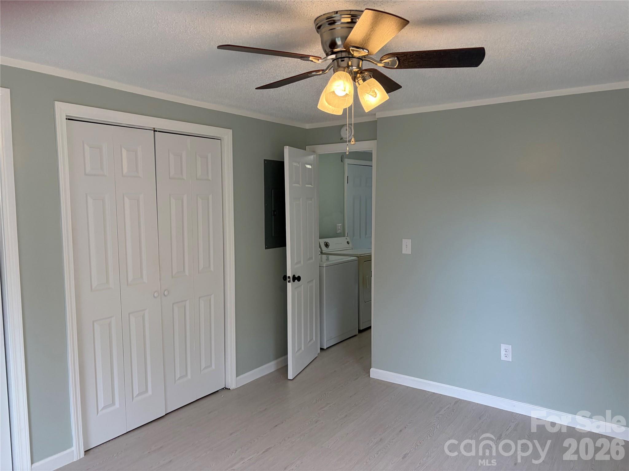 590 Adams Road Morven, NC 28119 - Photo 12 of 15 wooden floor in an empty room with a window