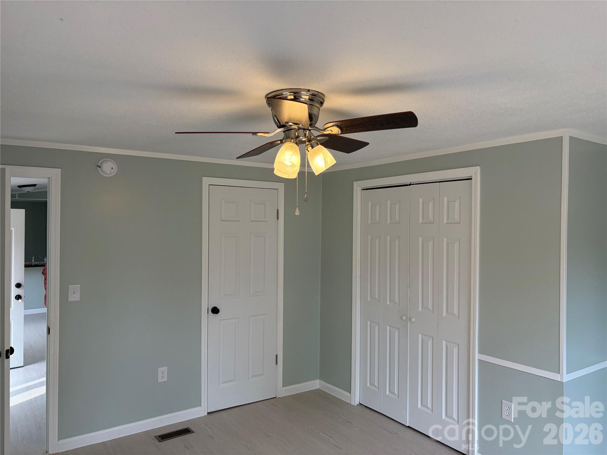 590 Adams Road Morven, NC 28119 - Photo 6 of 15 a light fixture in a room