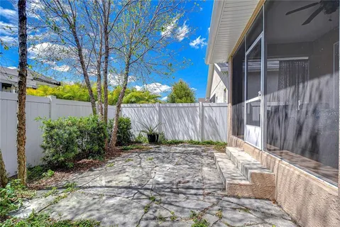 a backyard of a house with lots of green space