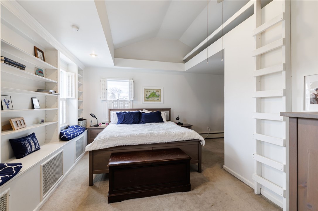 1116 Whitney Road East Perinton, NY 14450 - Photo 18 of 34 PRIMARY BEDROOM WITH WALK IN CLOSET