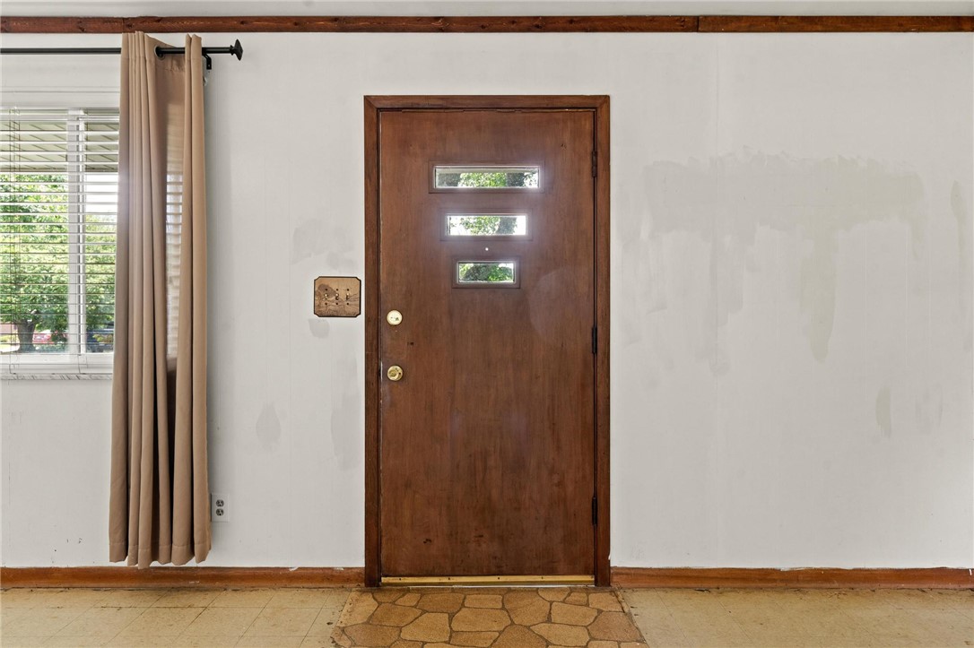 4150 Rose Marie Road Franklin, OH 45005 - Photo 11 of 36 A classic wooden entry door provides a warm welcome into this comfortable abode.