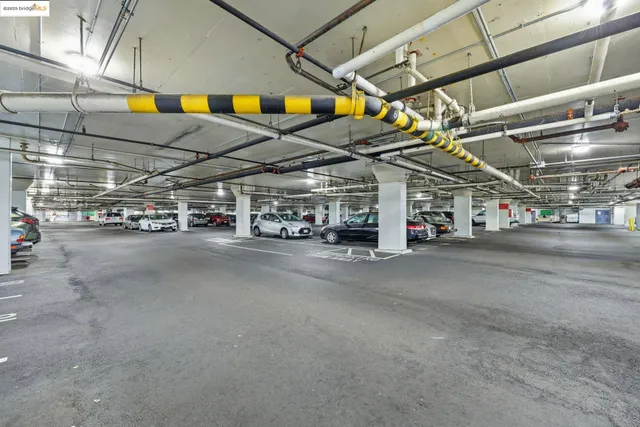 a view of a balcony with wooden floor and fence