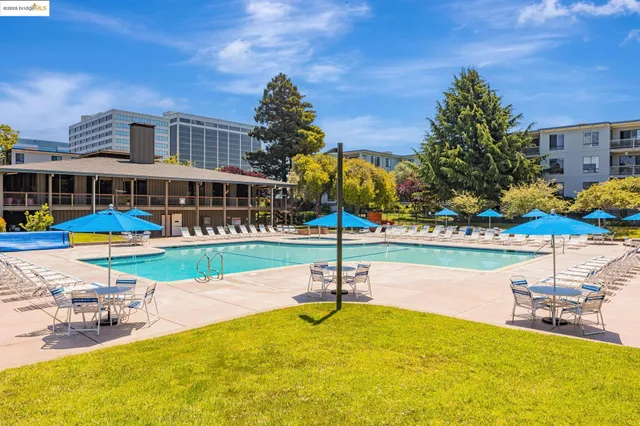 a living room with furniture and white walls