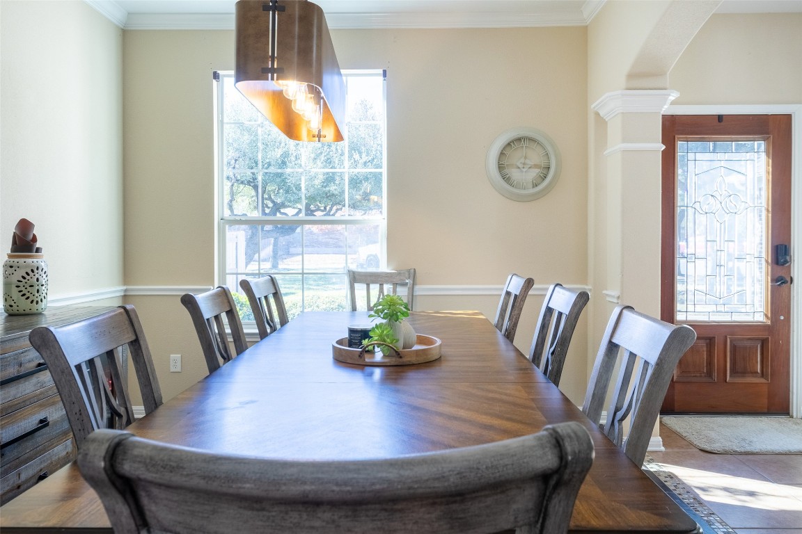 3113 Quail Run Round Rock, TX 78681 - Photo 15 of 29 Second Dining /Living area with ornamental molding, arched walkways